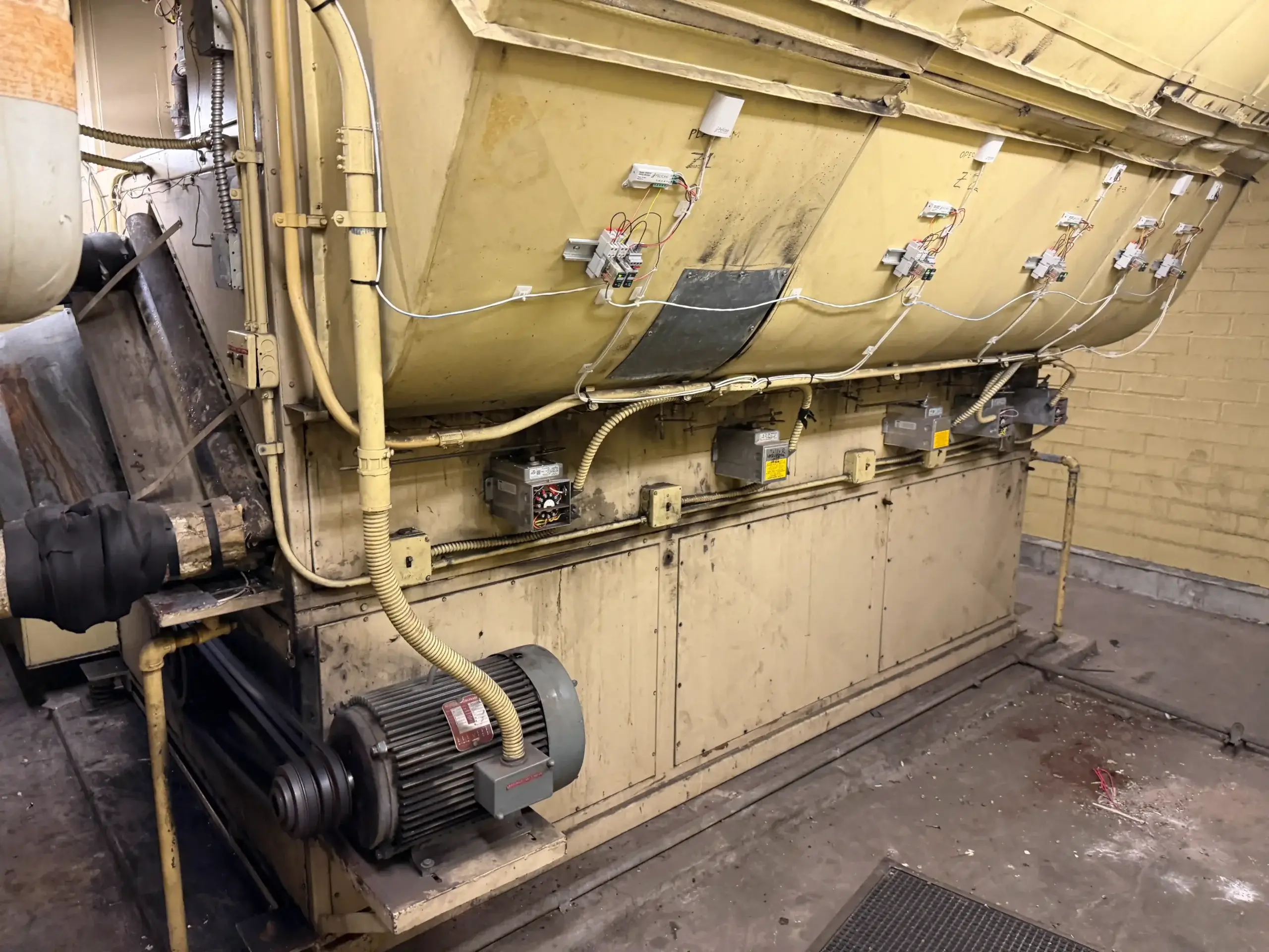 Commercial air handling unit in mechanical room