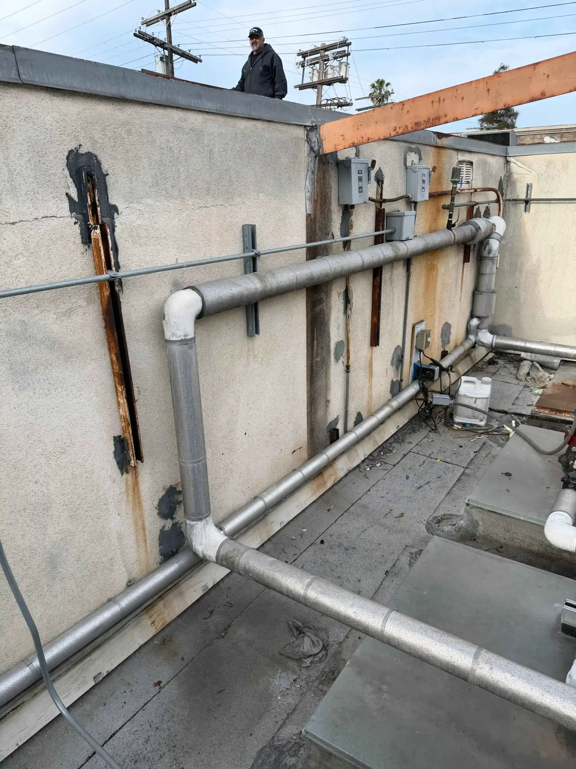 Commercial rooftop mechanical piping before VRF replacement