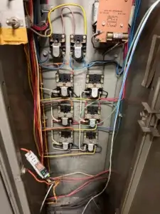 Electrical relays and wiring inside HVAC control panel
